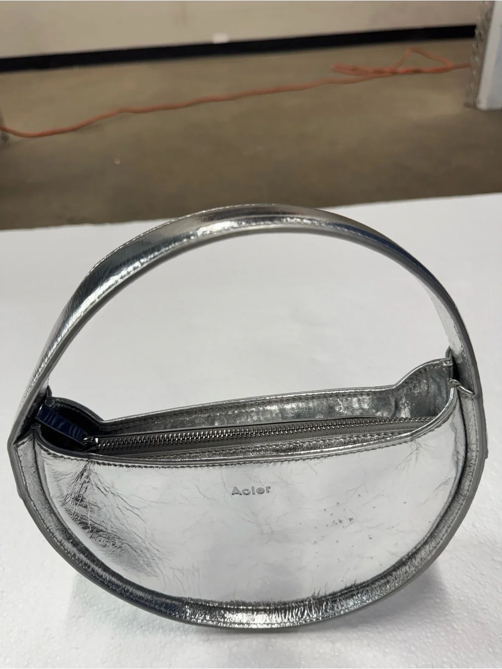 Acler circular handheld
